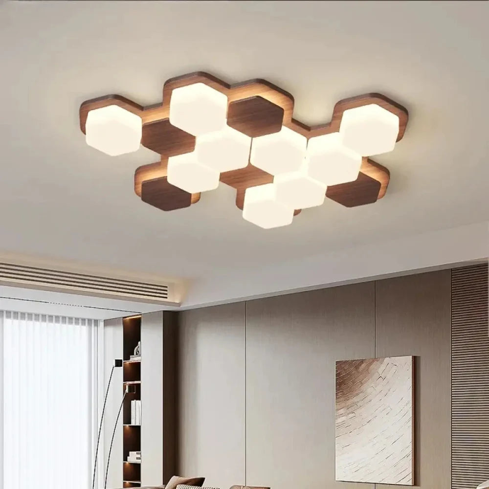 Lustre bois hexagone nordique grand format blanc chaud salon ouvert