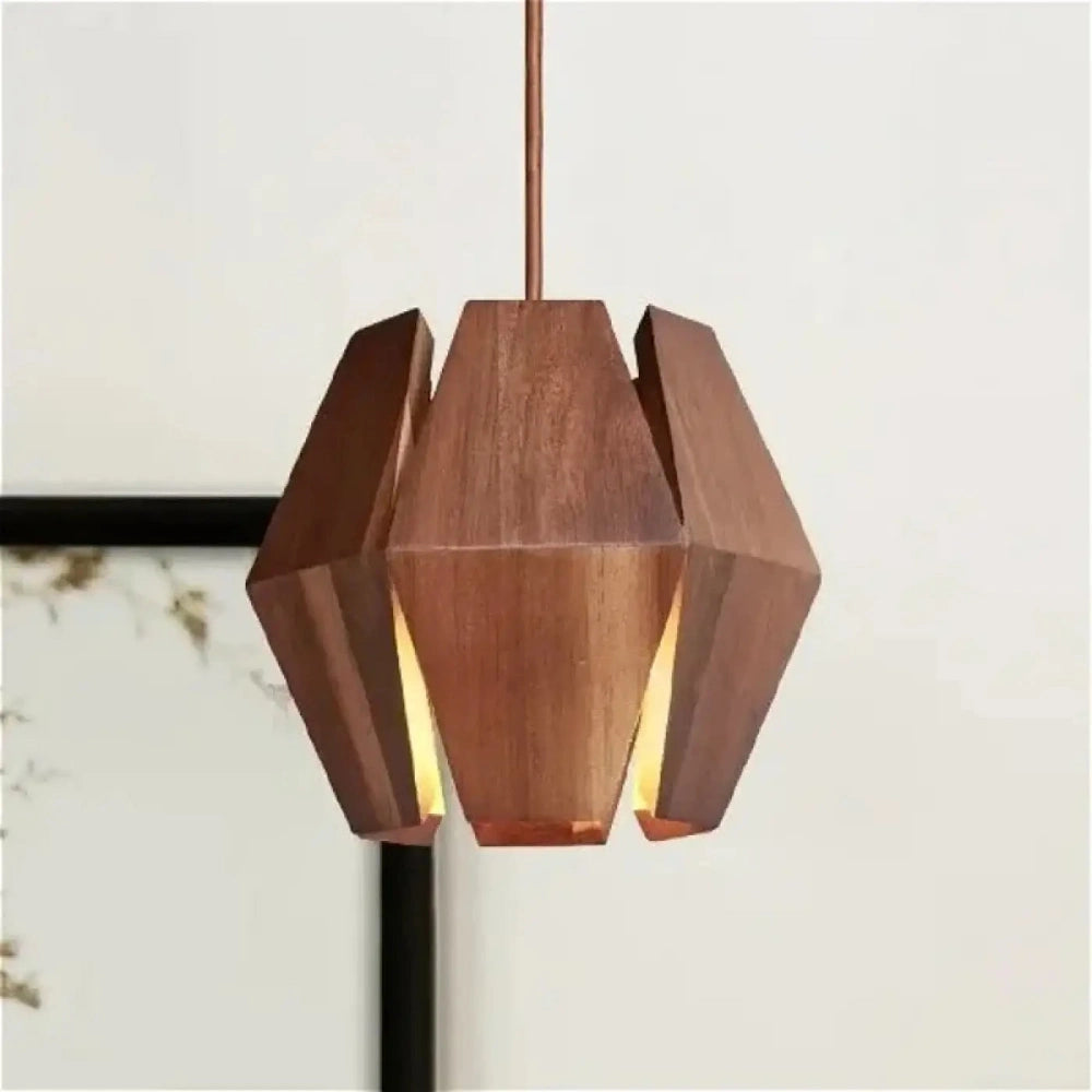 Lustre suspension noyer sculpté géométrique fentes bois
---