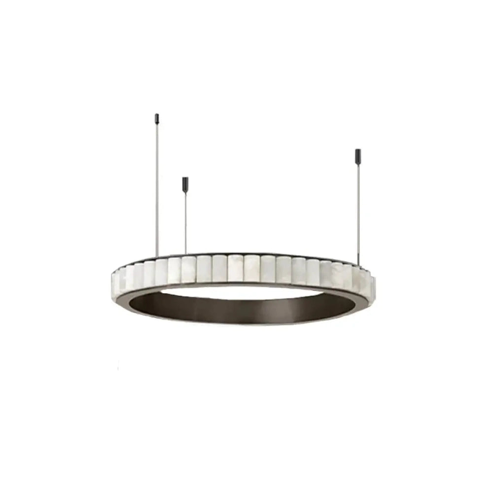 Luminaire anneau marbre salon contemporain lumière chaude tamisée
