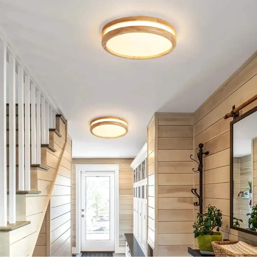 Lustre double cercle bois clair naturel suspendu au plafond