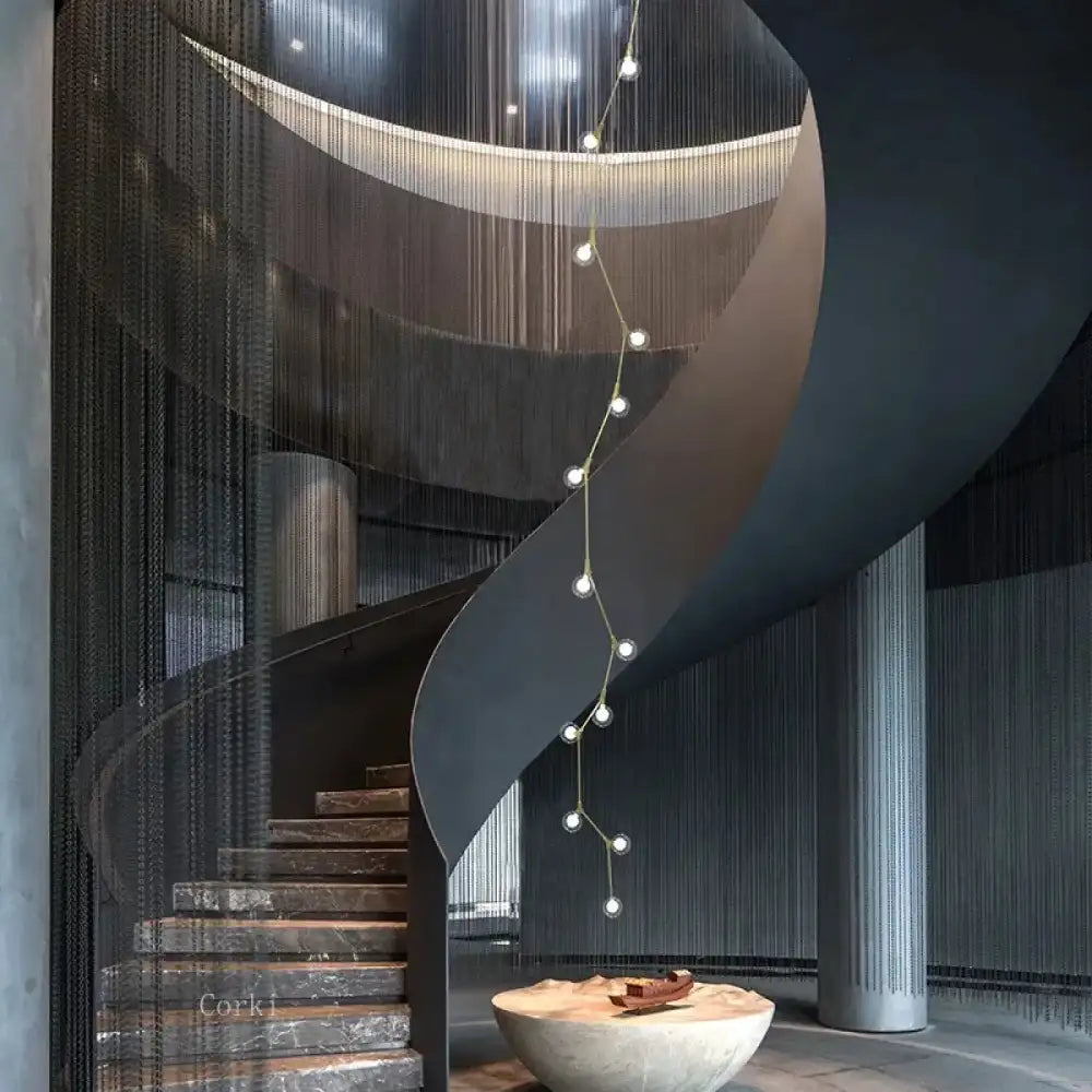 Lustre boules métal doré cascade spirale suspendu plafond salon