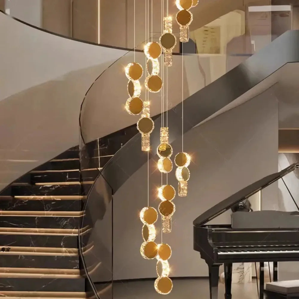 Lustre cristal cascade doré suspension escalier verre