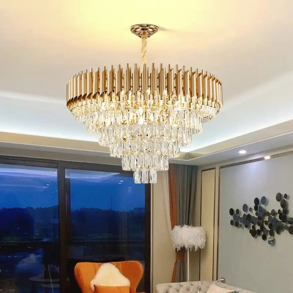 Lustre cristal couronne pampilles acryliques dorées style prestige