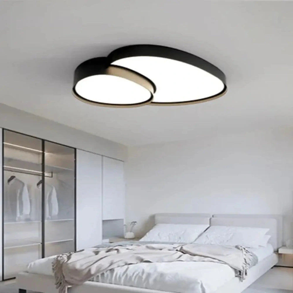 Lustre organique noir métal acrylique forme asymétrique
