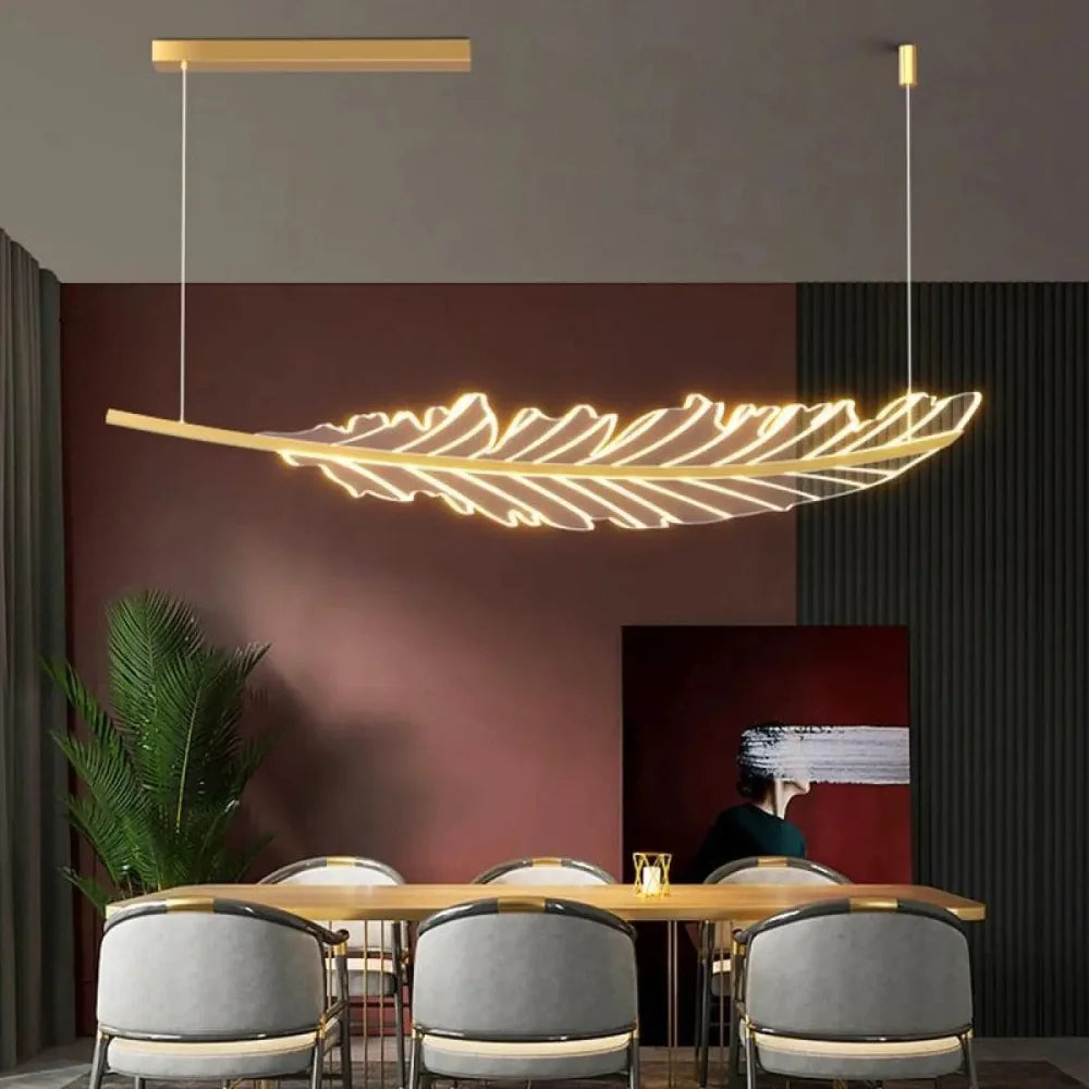 Lustre suspension plumes aluminium doré design contemporain