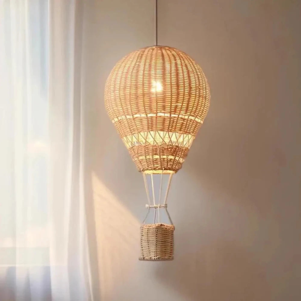 Lustre rotin tressé forme montgolfière noir bohème