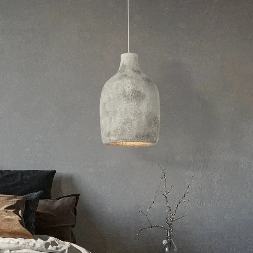 Lustre vase résine aspect plâtre gris minéral suspension

---