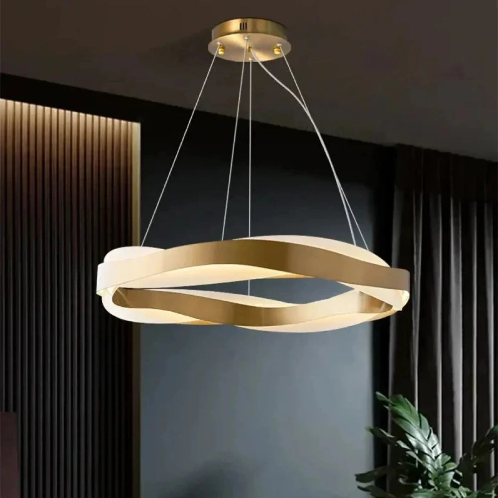 Lustre suspension nœud métal laiton doré design contemporain salon salle à manger

---