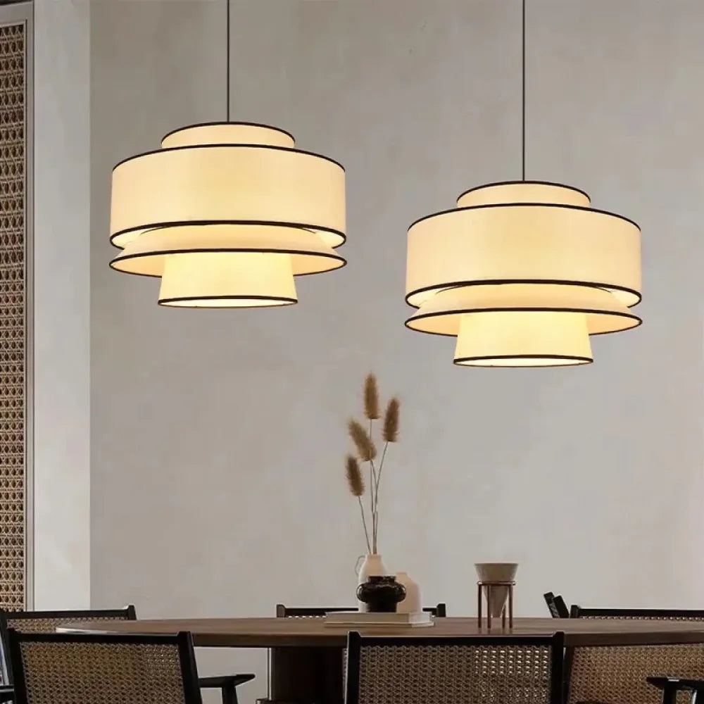 Lustre suspension tissu beige étagé rond contemporain trois niveaux