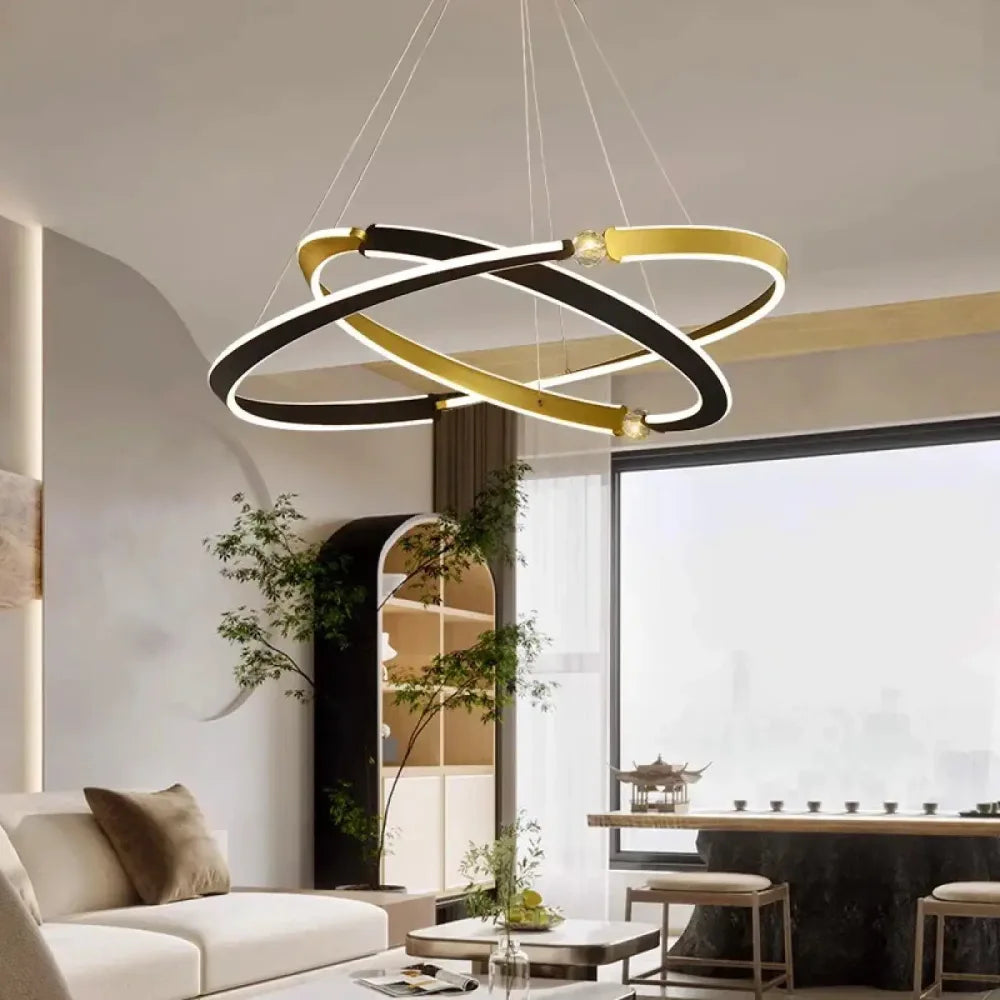 Lustre triple anneau noir doré vue de face anneaux concentriques