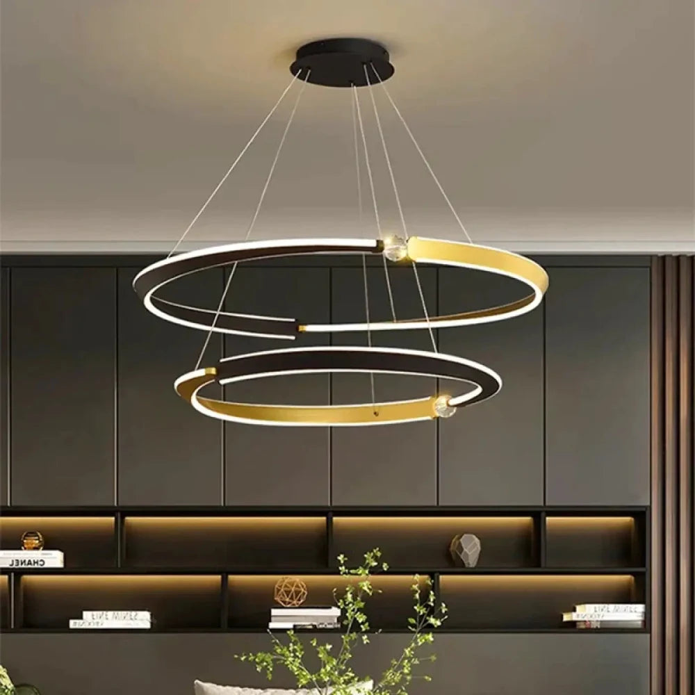 Détail finition métal noir mat et doré lustre triple anneau