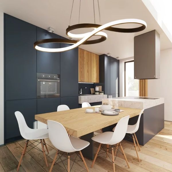 Suspension LED dimmable anneaux blancs salle à manger design.
